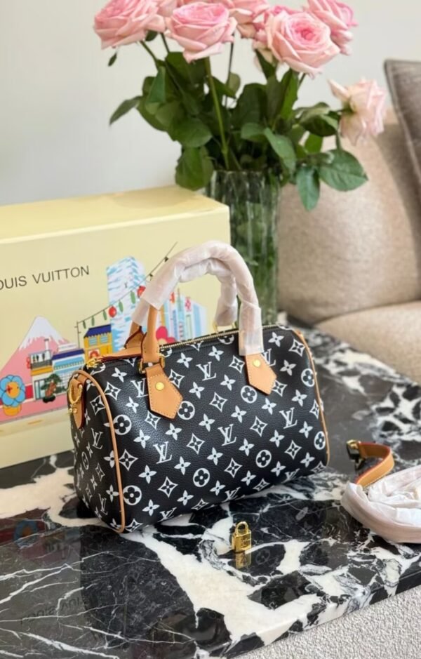 3F2922FBF4F53410D89C05F91FD64743 43-Speedy Bandoulière 25 Monogram Leather Handle Bag