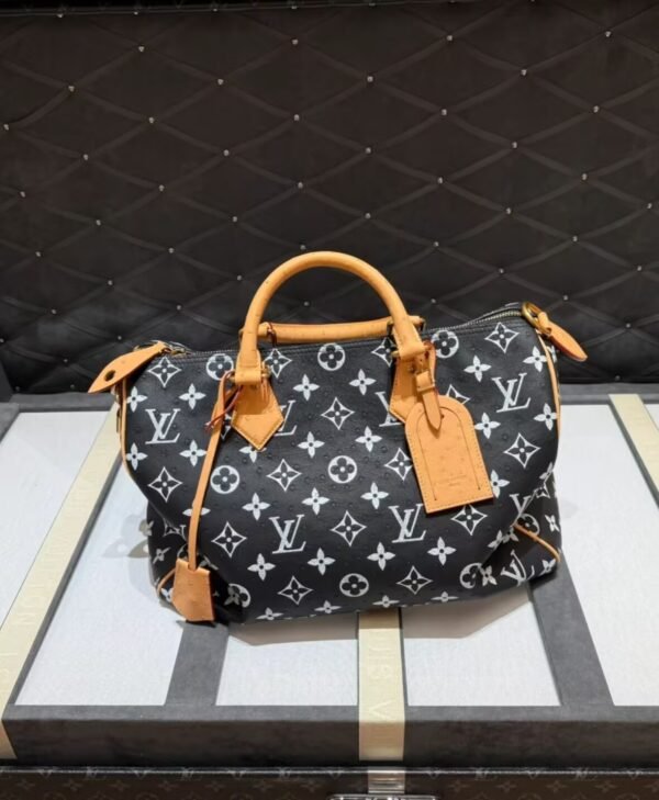 CCE591DD1FCD7EB85901BFD6EB6E28F2 43-Speedy Bandoulière 25 Monogram Leather Handle Bag